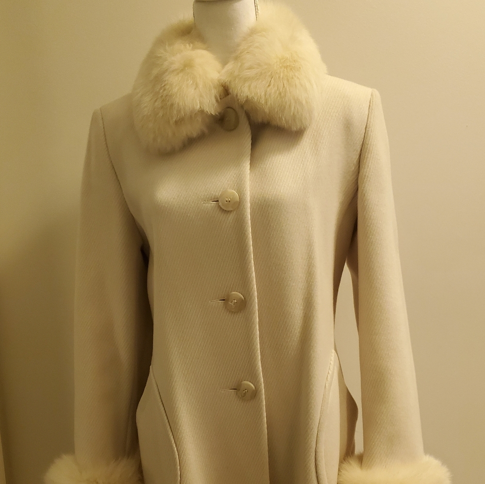 Glamorous ladies coat with fur collar
